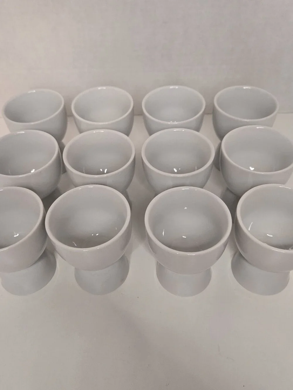 Set of 12 White Porcelain Double Egg Cups